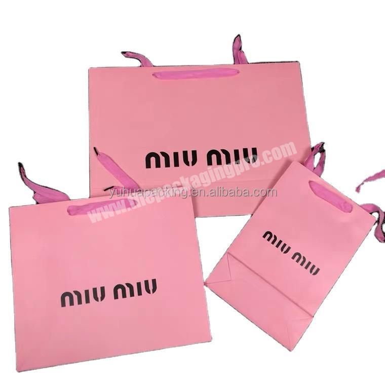 Custom design luxury paper packaging gift bags with gold foil logo color recycle cardboard bag for clothing