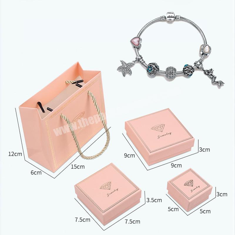Custom wholesale luxury gift packing ring paper small jewellery box for paper bag shipping