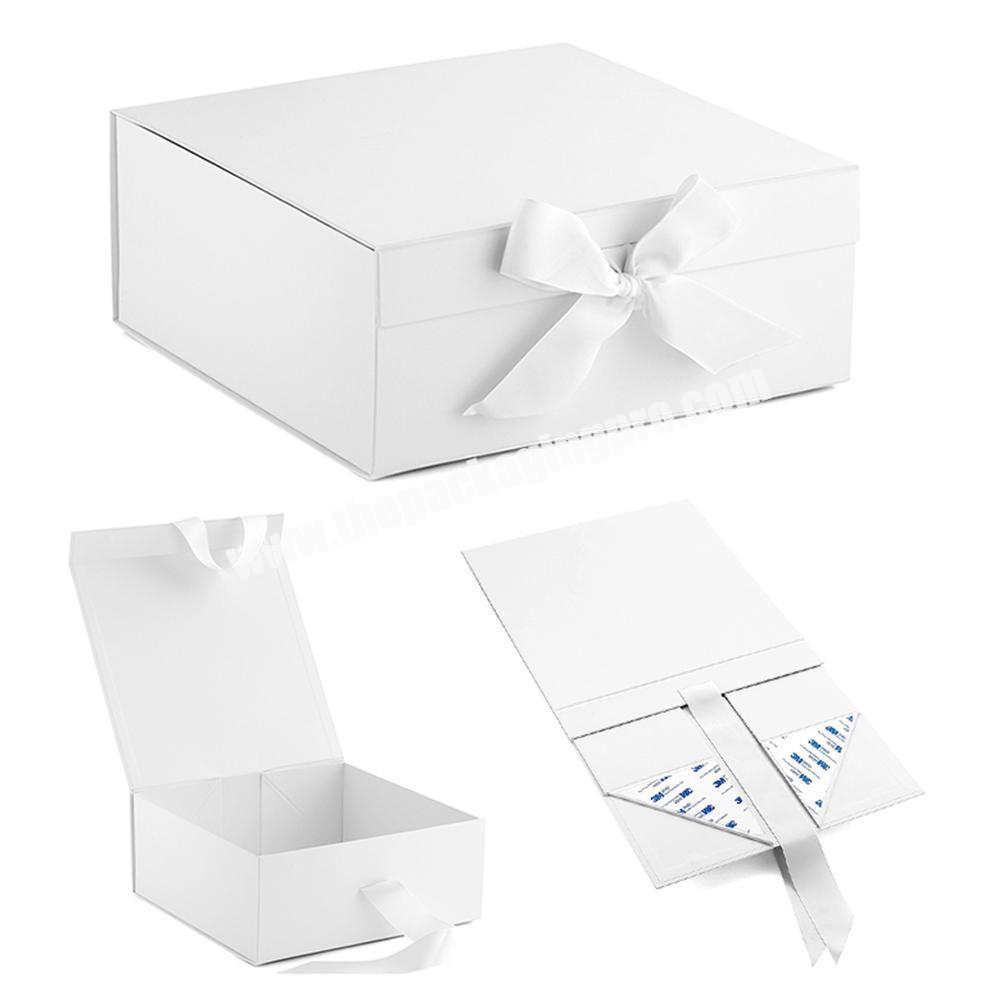 Customized Packaging Foldable White Magnetic Book Shape Rigid  Paper Gift Boxes With Ribbon