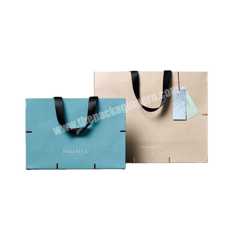 High Quality Embossing Packing Bags Paper Bag ribbon handle For Clothing