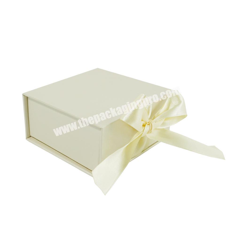 Light yellow cardboard square clamshell magnetic soap packaging handmade nude gift box with ribbon  logo for clothing