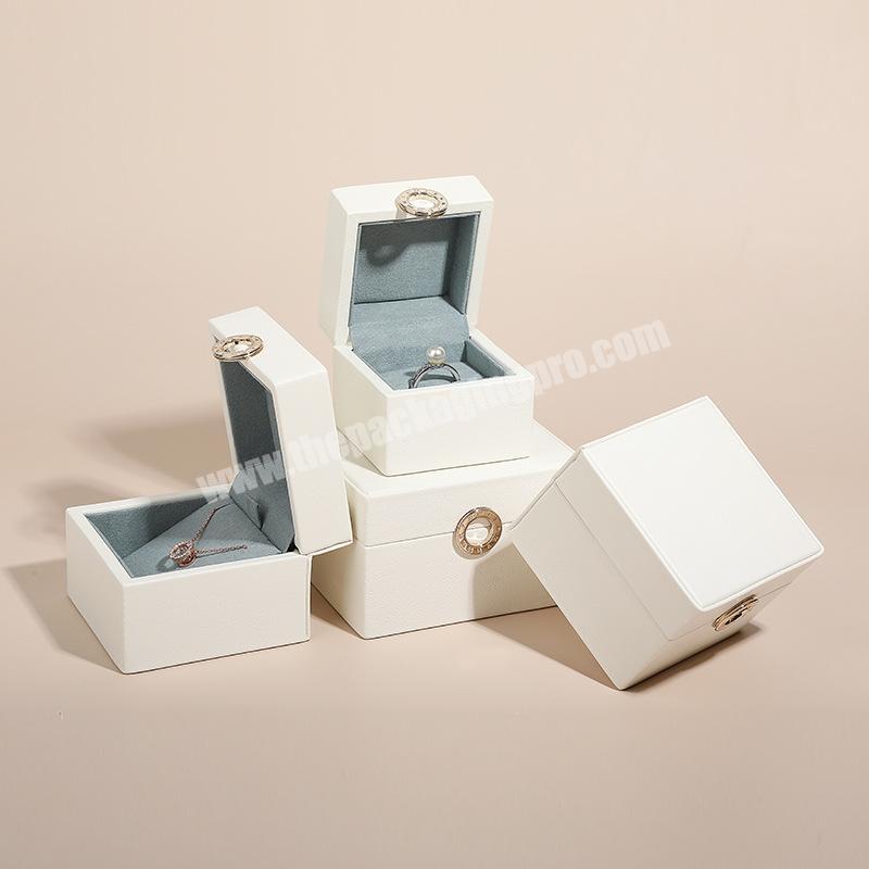 Luxury beige pu leather acrylic ring earring bracelet jewelry storage box fancy small leather watch packaging box with pillow