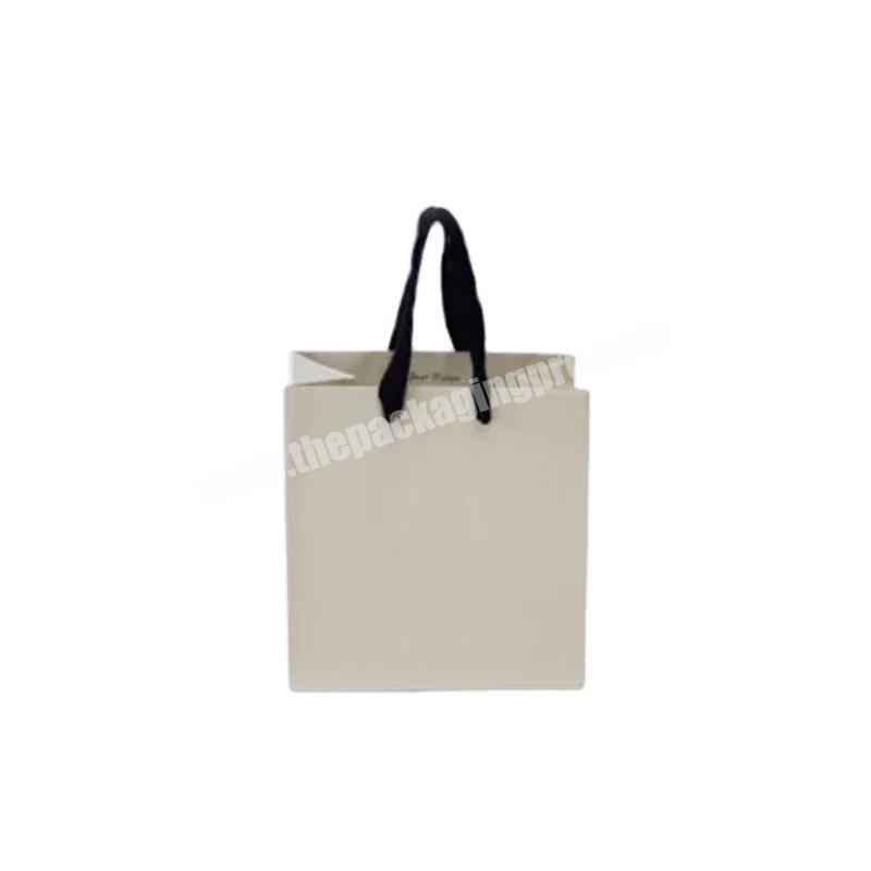 Wholesale Luxury Branded Bags Washable Christmas Gift Mini Kraft Paper Bag With Handle With Printing For Clothes