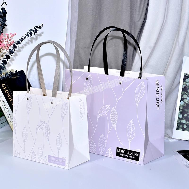2022 wholesale craft paper bag custom design printed paper gift