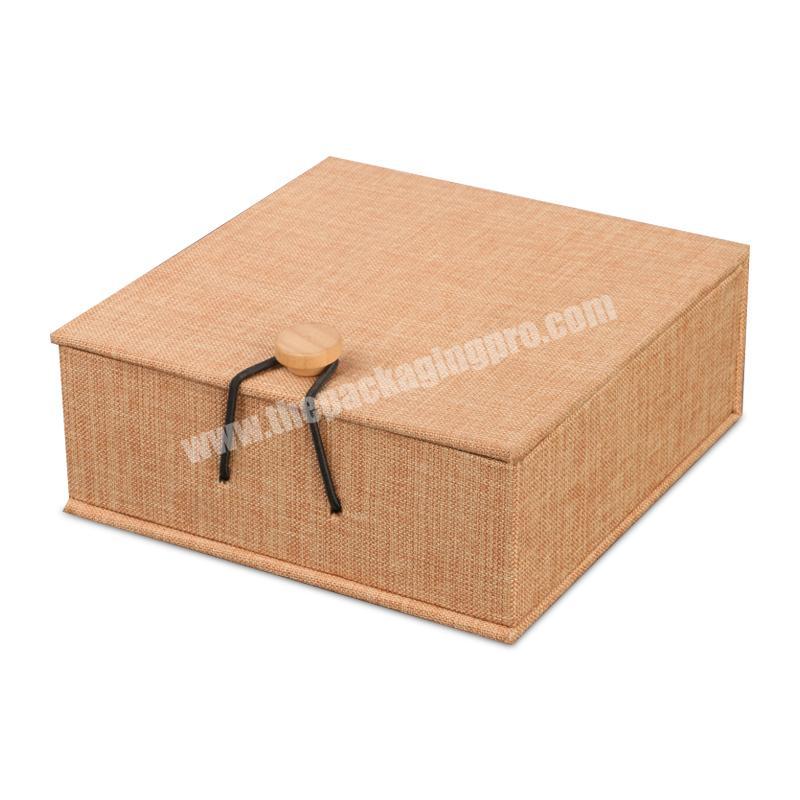 customized small size liner wooden texture rigid gift box with button closure for sample products