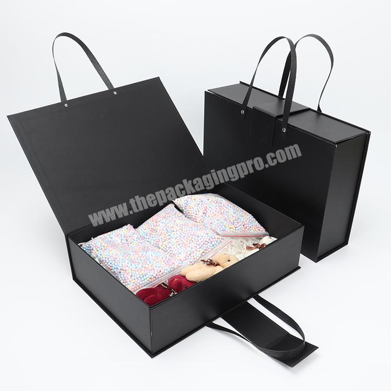 2022 New Design Custom Black Hard Paper Handle Design Portable Folding Gift Wig Extension Packaging Box