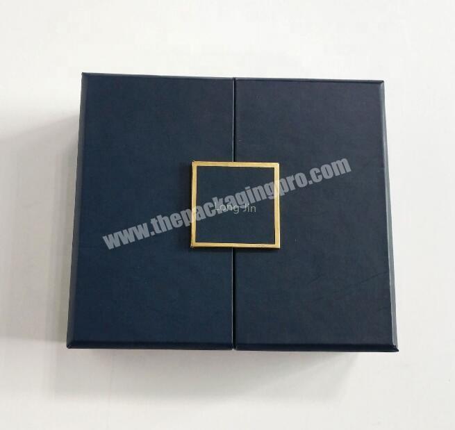 Cardboard paper box with metal flap