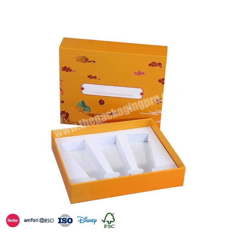 China Hot Sale Yellow landscape painting embellished with waterproof material cosmetic box packaging