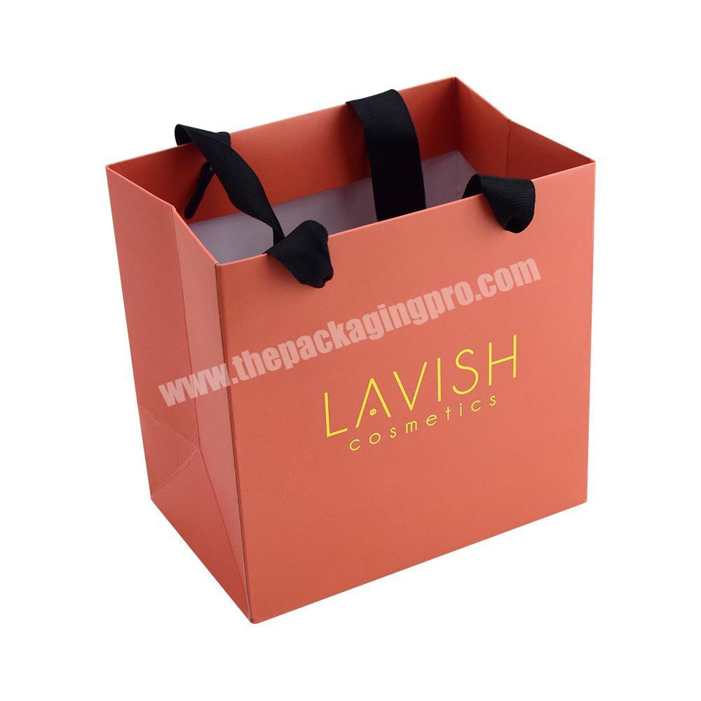 Custom Gold Foil Logo Stamped Rigid Paper Magnetic Box with Eva Foam Insert for Cosmetic Glass Bottle Packaging with Paper Bag wholesaler
