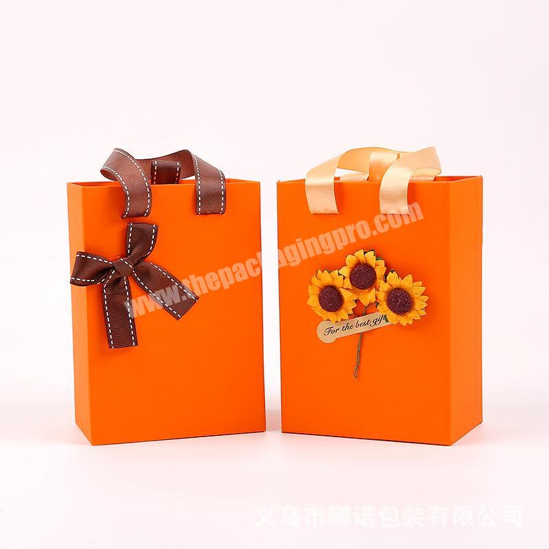 Custom Luxury Gift Clothes Cosmetic Pack Boxes Lid And Base Paper Rigid Orange Colored Cardboard Box For Shipping With Handle