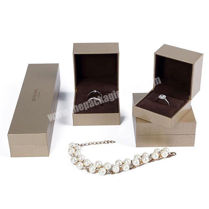 Custom Luxury fashion new plastic golden color private label jewelry boxes