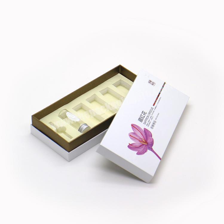 Customized luxury white cosmetics perfume essential oil bottle packaging box with foam insert