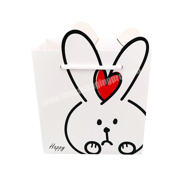 Factory Low Price Cartoon Animal Gift Bag With Handle White Pink Heart Rabbit Pattern Paper Shopping Bag wholesaler