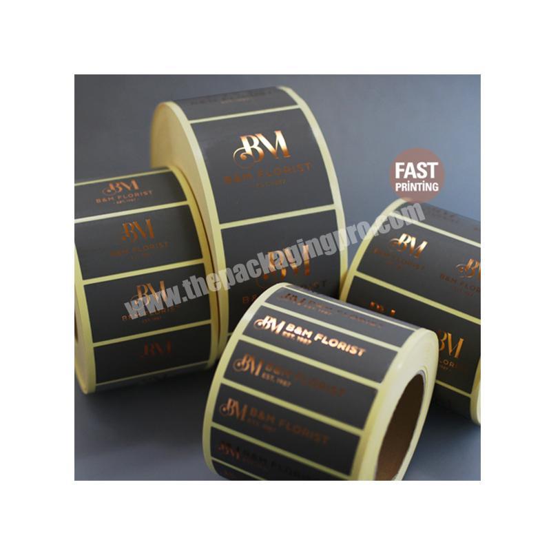 Factory custom black printed metallic rose gold foil label on roll