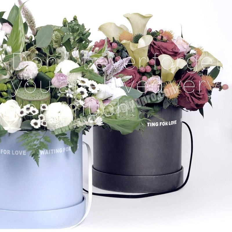 Hot Sale Luxury Black White Color Paper Cylinder Round Flower Bouquet Boxes Flower Hat Packaging Boxes With Handle In China