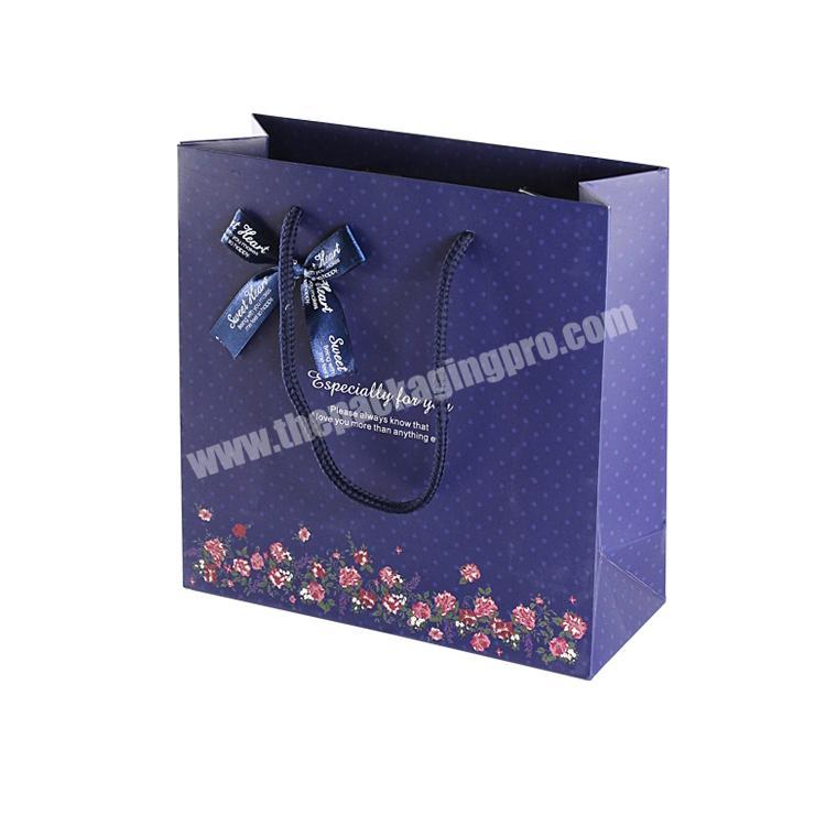 Hot Selling Shopping Packing Retail Bags Package Bulk Custom Logo Printed Matt Dark Blue Floral Paper Gift Bags For Business