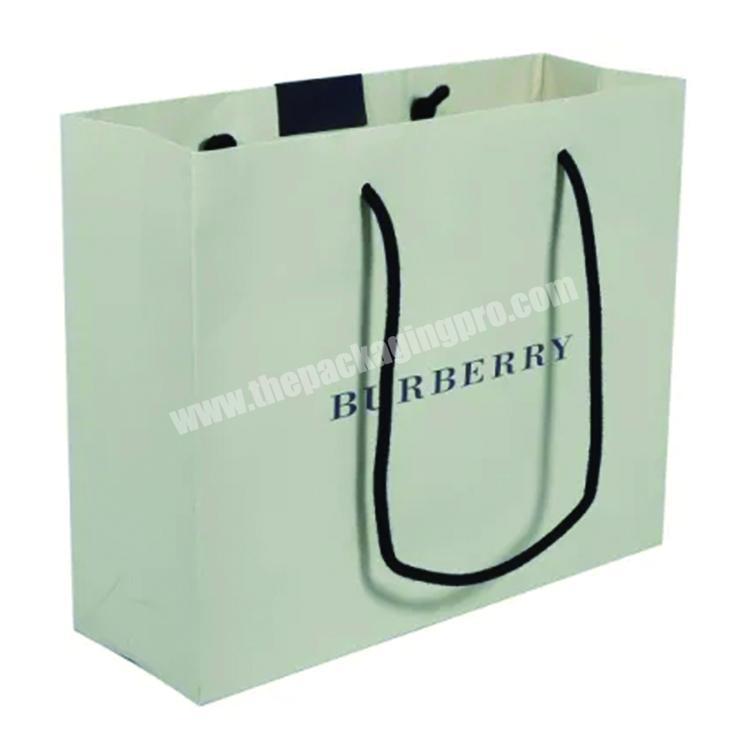 Luxury white Kraft Clothing Garment Packaging Paper Bags for Clothes