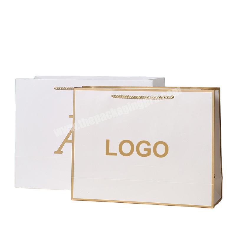 REYOUNG OEM Saco De Papel Custom Logo Printed New Design Ribbon Handle Gift Bag Red Shopping Paper Bag With Your LOGO