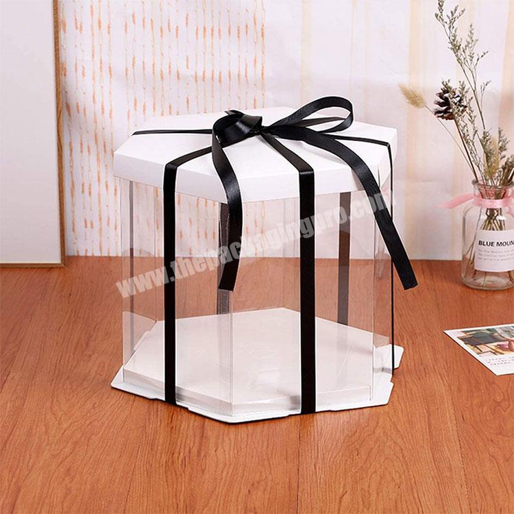 https://thepackagingpro.com/media/goods/images/2022/8/Transparent-pvc-Cake-Box-Pre-folded-Lid-Baking-Cookie-Display-Pack-2-Pcs-Clear-Plastic-Hexagon-Cake-Box-with-lid-2.jpg