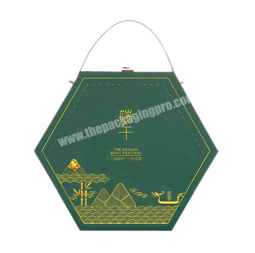 Wholesale paperboard hexagon paper gift box with handle