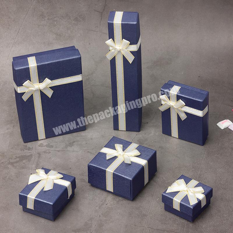 custom design blue color paperboard wedding earring ring box with ribbon tie