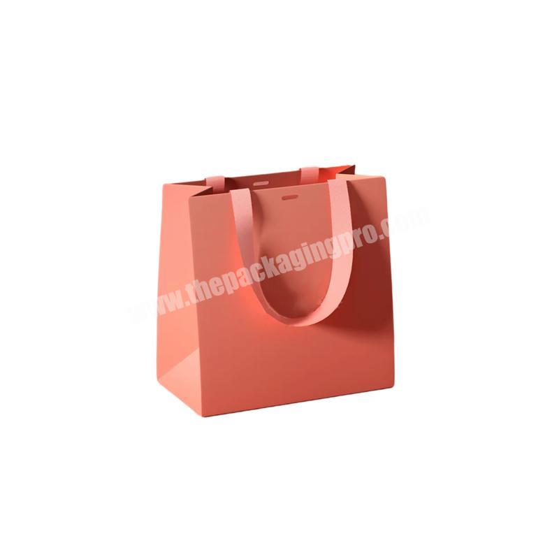 Custom Color Size Design Logo Pink Paper Gift Bag With Ribbon Handles Manufacturer