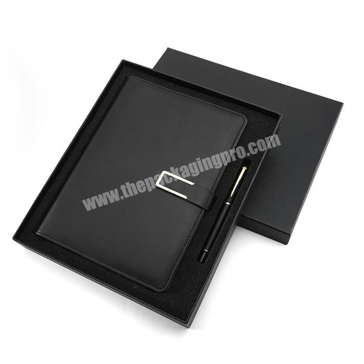 Source manufacturers custom embossed logo luxury A5 PU leather notebook with pen