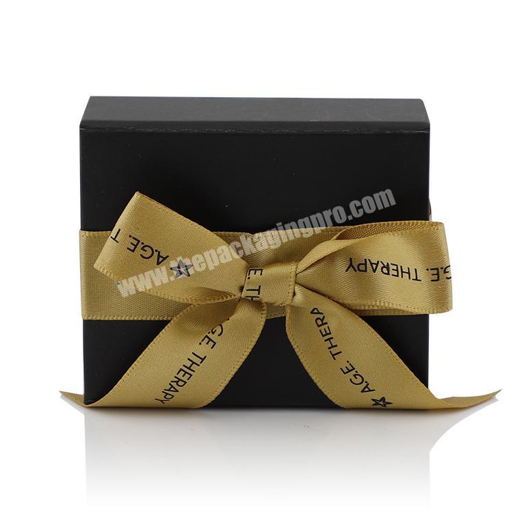 Wholesale luxury black small folding packaging custom logo magnetic paper gift box with ribbon closure factory