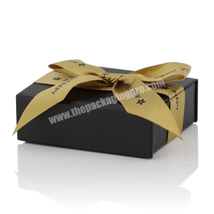 Wholesale luxury black small folding packaging custom logo magnetic paper gift box with ribbon closure