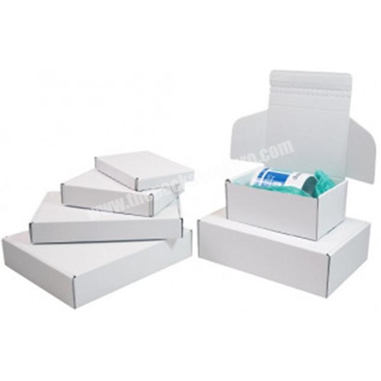 white kraft corrugated cardboard postal mailer packaging mailing shipping box