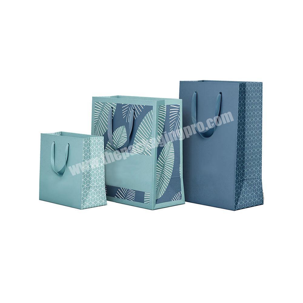 Custom logo recyclable packaging clothing kraft shopping paper bag with ribbon handle