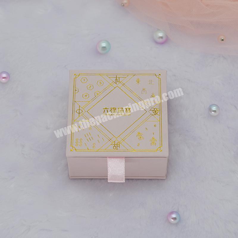 Hot Sales Custom Logo Cardboard Paper Box Cosmetic Skin Care Box Perfume Packaging Drawer Box With Ribbon