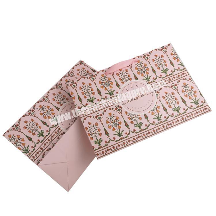 Custom logo print wholesale  pink kraft paper gift bag with handle Item Industrial surface packaging