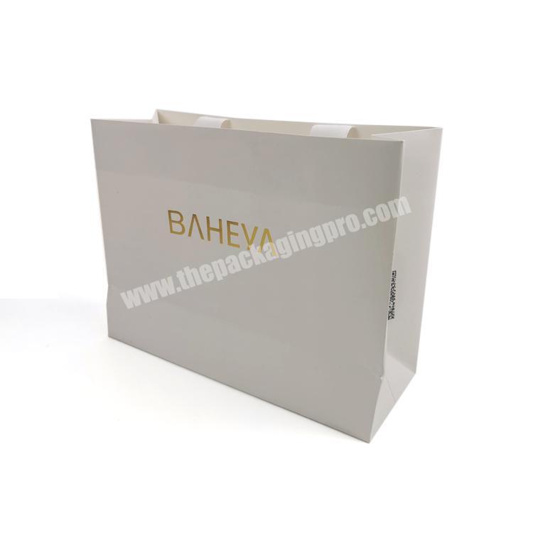 High quality hot stamping shopping bag custom your logo printed fashion paper bag with ribbon for shoes and clothing