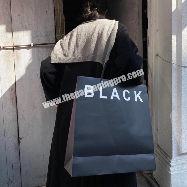 Luxury high quality black kraft paper bag  hot stamping black gift bag with ribbon handle and logo