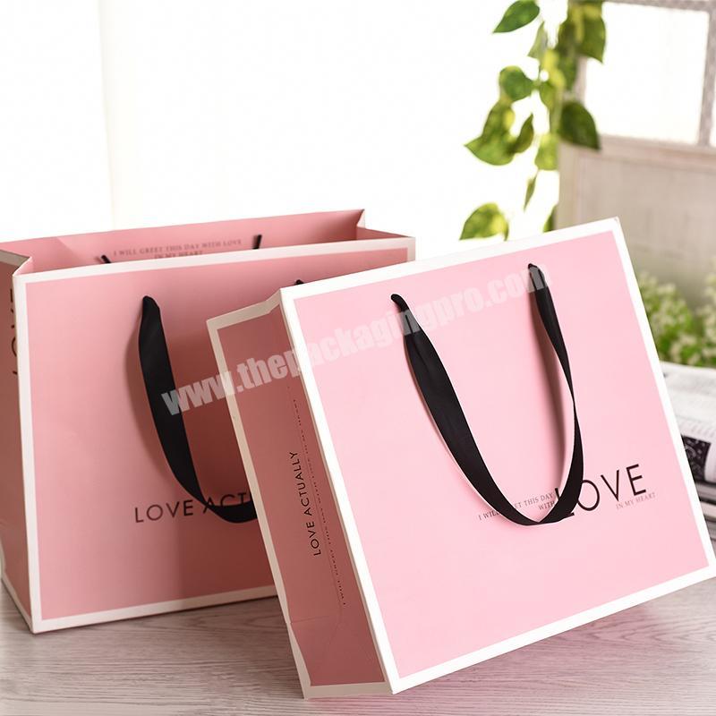 Recycled fashion handle glossy custom kraft gift paper bag with your logo