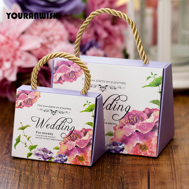 YOURANWISH 50pcs Portable wedding candy box favors box paper gift bag packaging box for guests party decoration supplies