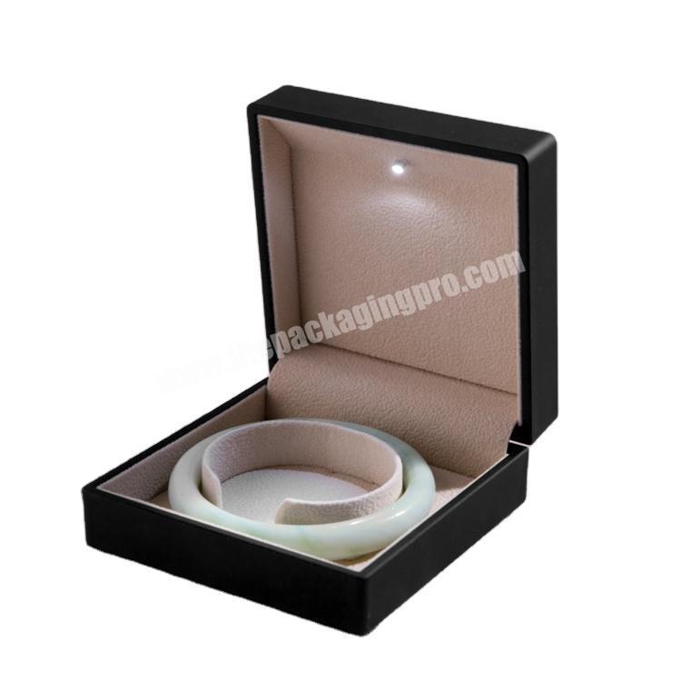 Black Jewelry bracelet Box in eco friendly black rubber finish and LED light bracelet box size 10 x 10 x 4.9cm