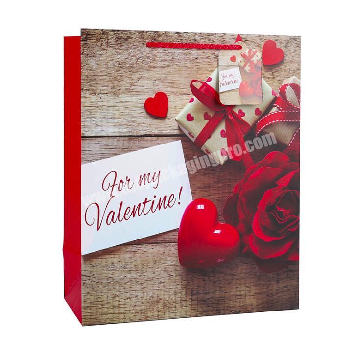 Cheap custom luxury small valentine gift red color paper bag with rose