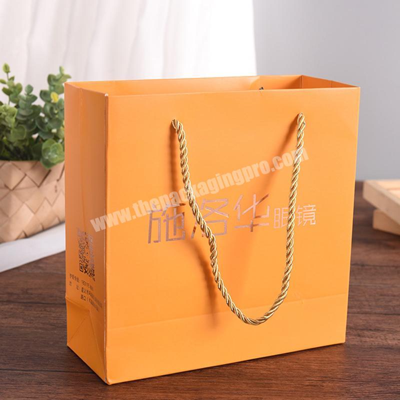 cheap custom printed wine paper packaging bag luxury design clothing packaging paper bag gift paper bag for jewelry packaging