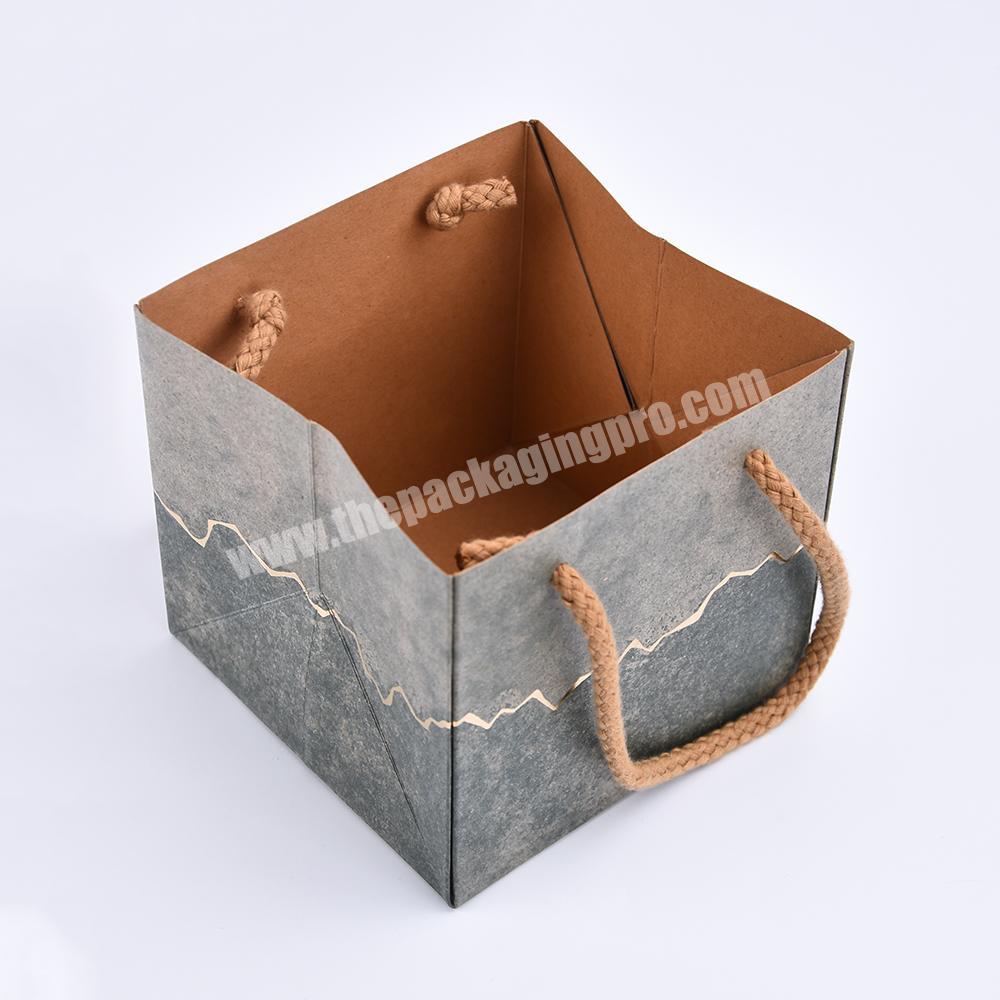 china custom logo 100% Recyclable gift kraft paper bag with handle