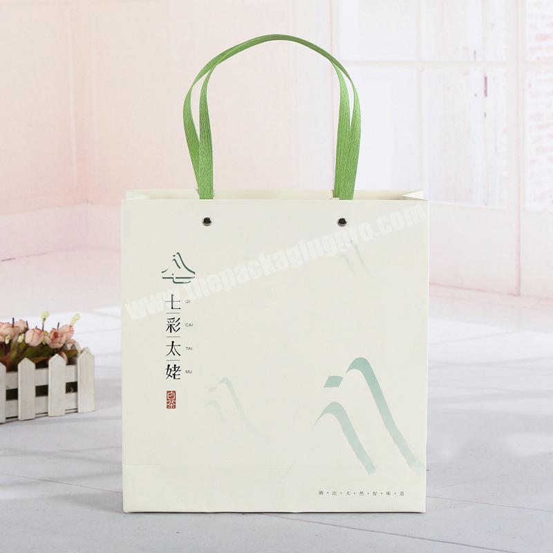 China Factory Glossy laminated light-colour luxury ivory board gift paper carrier bag,shopping paper bag