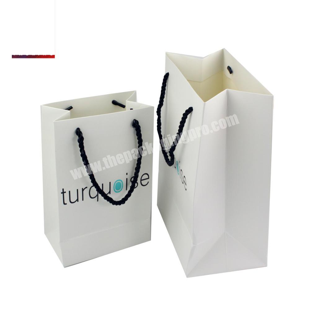 China low cost custom print gift paper bag manufactures