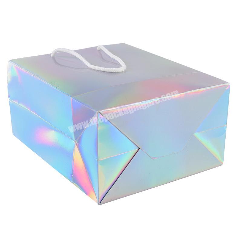 China Manufacturer Custom Luxury Logo Printed Holographic Laser Paper Packaging Bag For Shopping Clothes And Gift