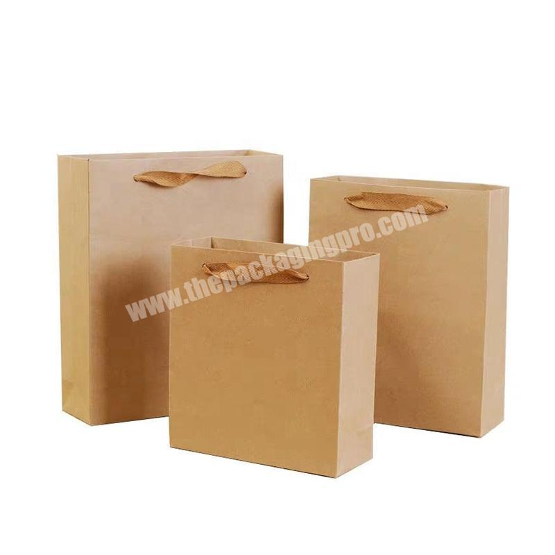 China Manufacturers Custom Printed Recycle Shopping Carry Kraft Packaging Paper Bag With  Cloth Handles