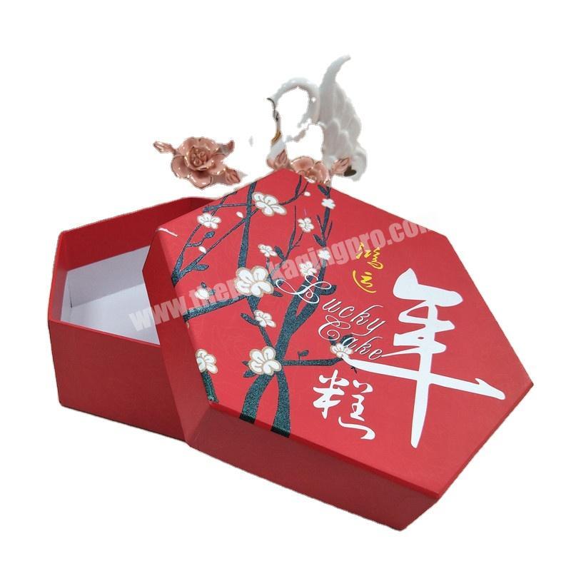 China Supplier Chinese gift paper packaging box sexabgle rigid box for New year present paper box packaging