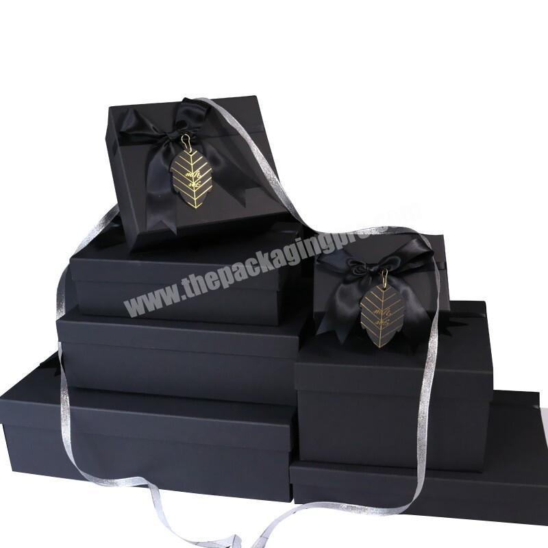 China Top Supplier Personalised Logo Printed Side Bow Customized Size Black Packed Box With Tag