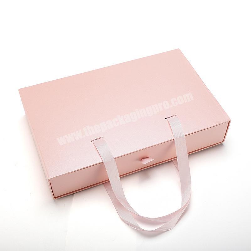 Chinese manufacturer custom gift box pink packaging clothes hand strap magnetic gift drawer box with ribbon gift rope