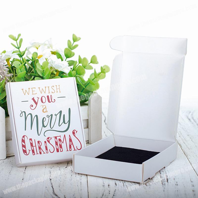 Christmas custom logo size coated paper christmas eve gift box with foam