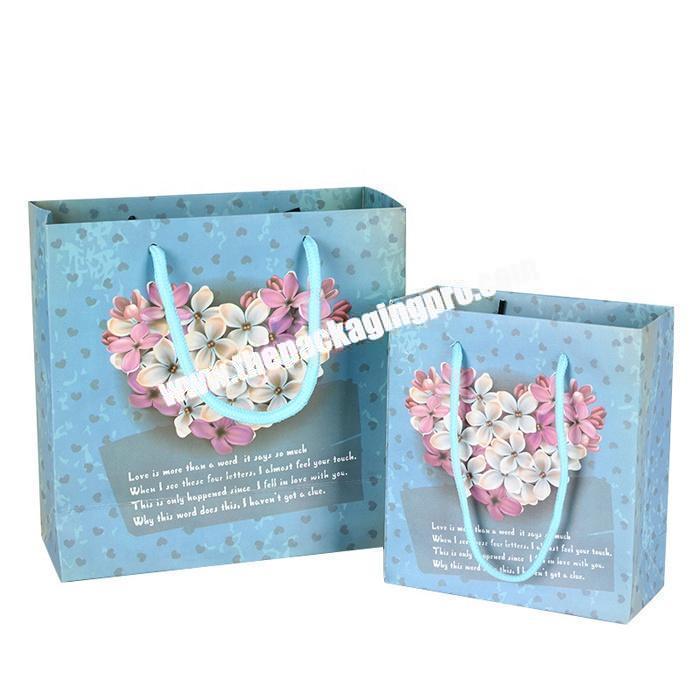 Custom cardboard paper gift packaging shopping bag with handle